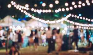 Festival Event Party with Hipster People Blurred Background